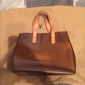 Louis Vuitton Reade PM In bronze AB