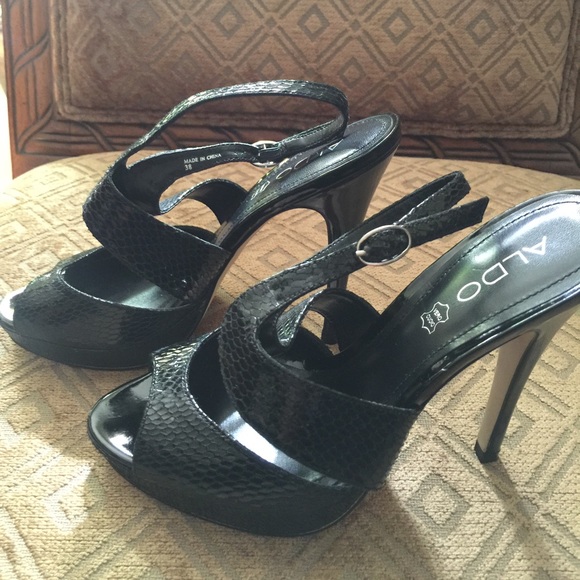 Aldo Shoes - Aldo snake skin platform heels...size 8