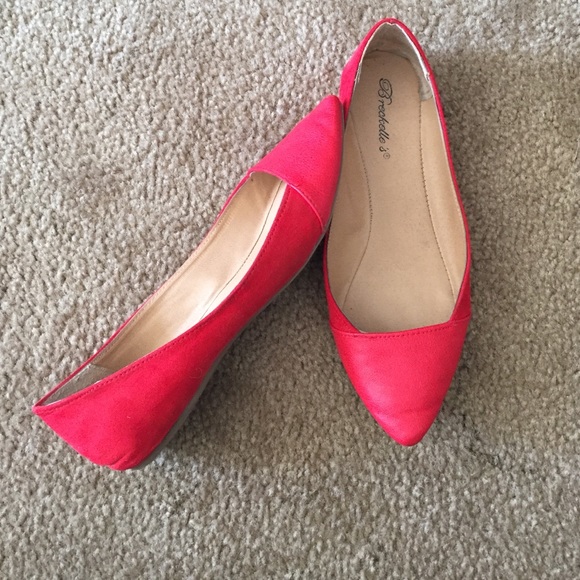 Red pointy flats