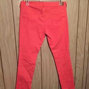 Coral AE skinny jeans
