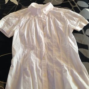 The limited white button down shirt