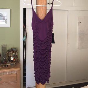 Beautiful BeBe deep purple ruched glam dress