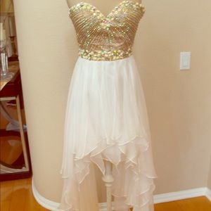 White Sherri Hill prom or homecoming gown.
