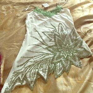 Beautiful white and green tank top with tag