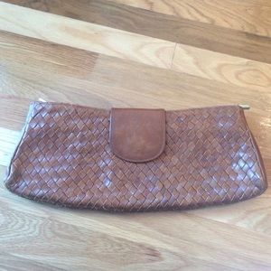 Anthro tan woven clutch 👛