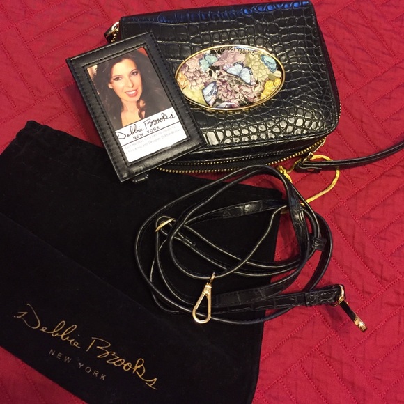 A Debbie Brooks cross body cellphone wristlet