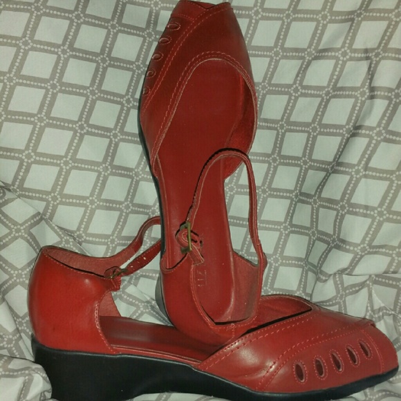 Red wedge peep toe sandals.