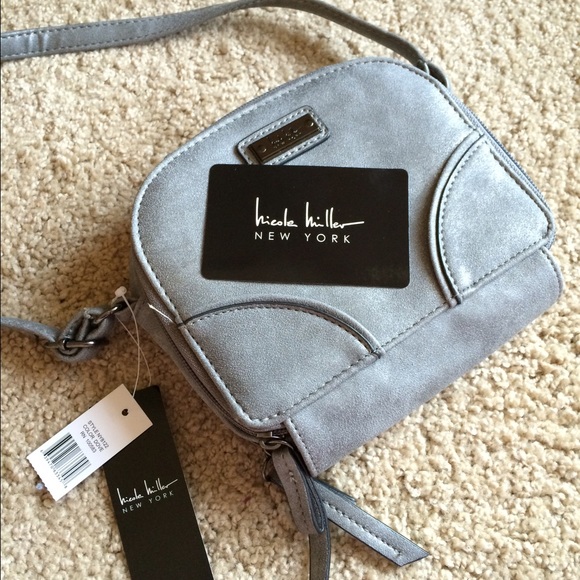 This is a cute Nicole Miller bag! New with tags!