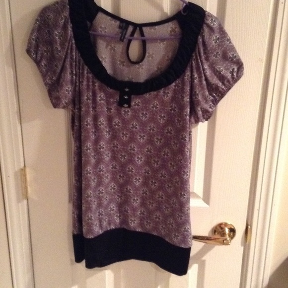 Sold Women's top color purple black size large