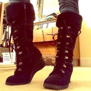 Tall black suede boots
