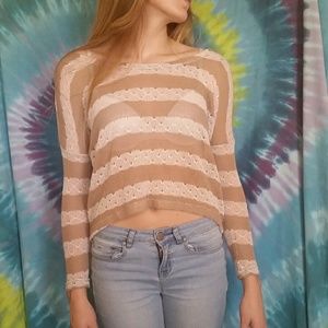 Striped sweater with heart shaped holes