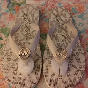 Michael Kors "MK" off white/cream flip flops