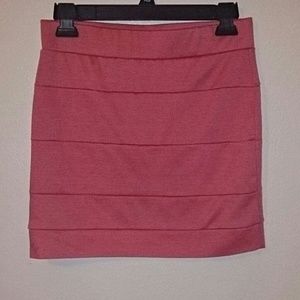 HOLDING Hot pink party skirt
