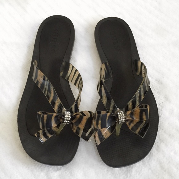 guess black flip flops with bow