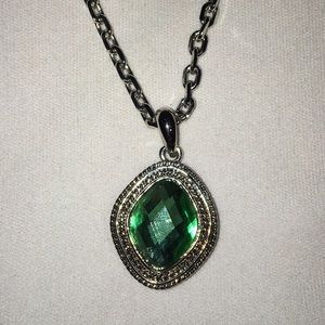 Emerald-green pendant on silver tone chain