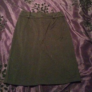 A line, knee length black skirt