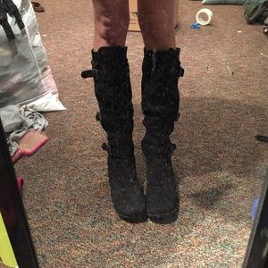 Tall black boots