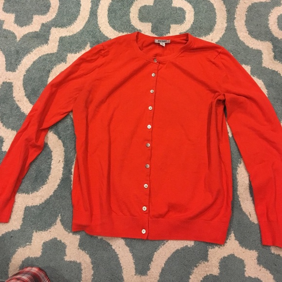 Red Old Navy branded sweater.