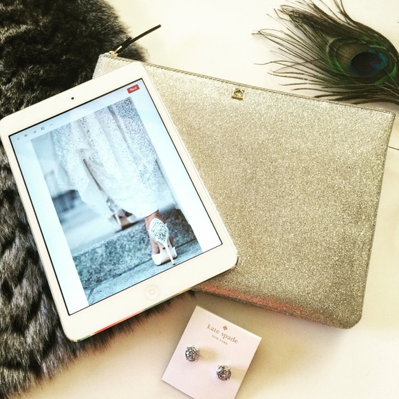 kate spade Handbags - Kate Spade Gia Silver Glitter Pouch