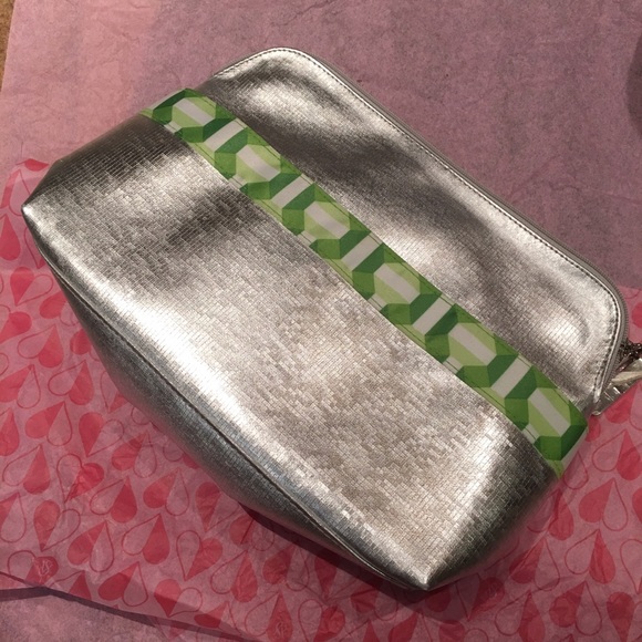 Clinique cosmetic bag in silver. Brand new. Large.