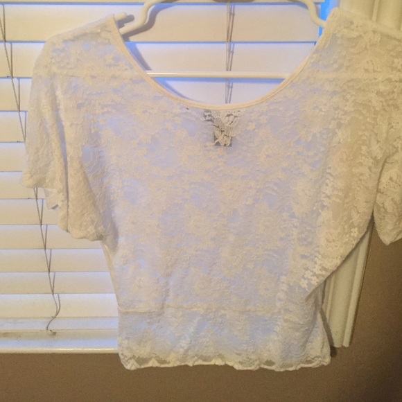 Short sleeved, front lace blouse.