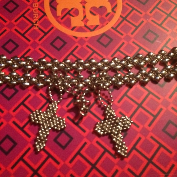 Liquid metal designer cross bracelet.