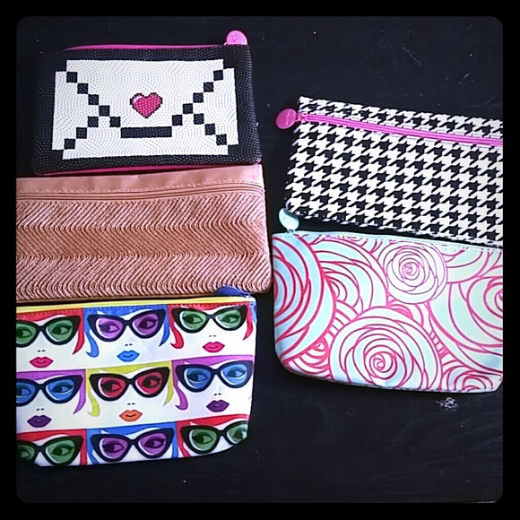 Lot of 5 ipsy glam bags.