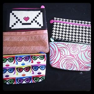 Lot of 5 ipsy glam bags.