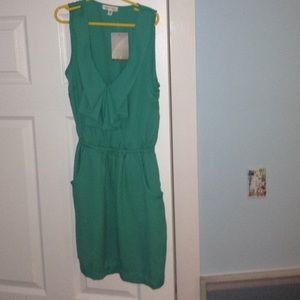 Blue green, nice dress.