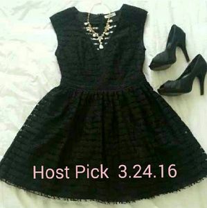 Sheer back, black dress