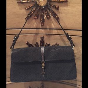 Preloved black with pewter Coach pouch purse