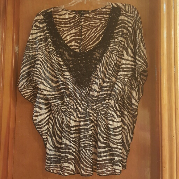 Very cute zebra top! Worn one time.