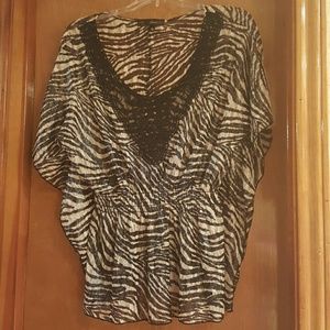 Very cute zebra top! Worn one time.