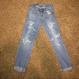 Distressed boyfriend jeans.