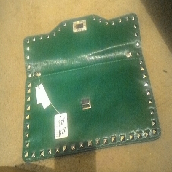 Large studded green clutch