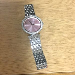 Michael Kors pink and silver watch.