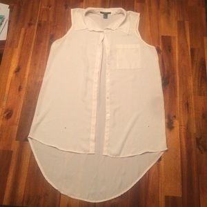 Small, white, thin, button down sleeveless blouse