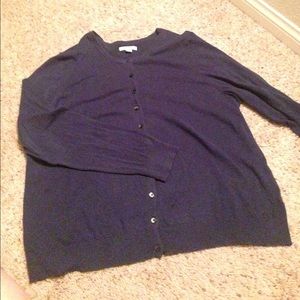 Navy blue cardigan sweater.