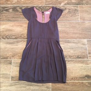 Gray dress with pink lining.