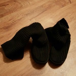 Tall black knit boots