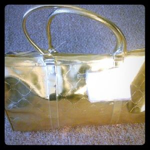 BCBG  gold overnight  bag new