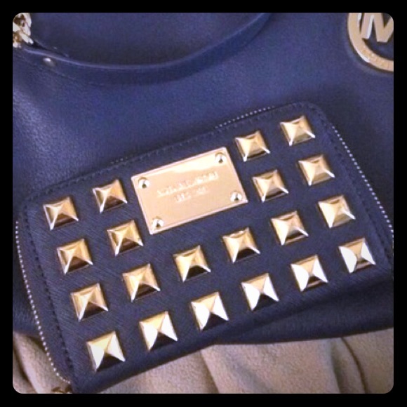 Blue and gold studded Michael Kors Wristlet
