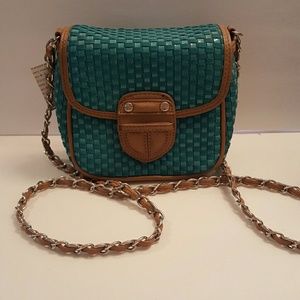 Poppie mini woven crossbody. Chain woven strap