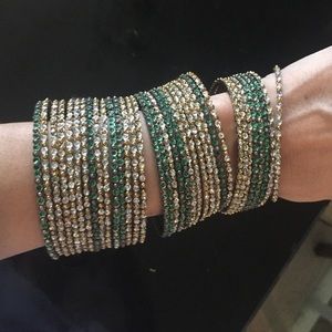 23 silver/green stackable bracelets