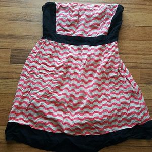 Sleeveless pink, beige, and black top