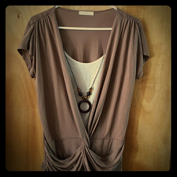 Brow and beige shirt