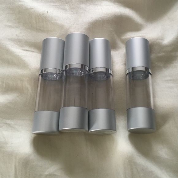 4 empty 1 oz bottles w pumps great for foundation - Picture 1 of 1