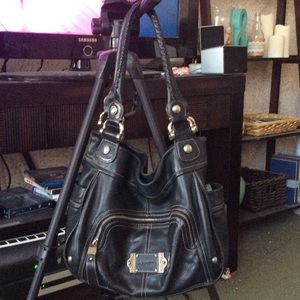 B. Makowsky black leather purse