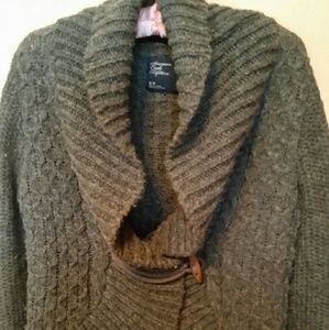 This sweater looks great with a low cut t.