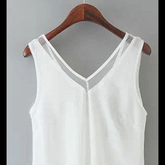 Tops - NWOT Sleeveless white top, sheer neck detail.